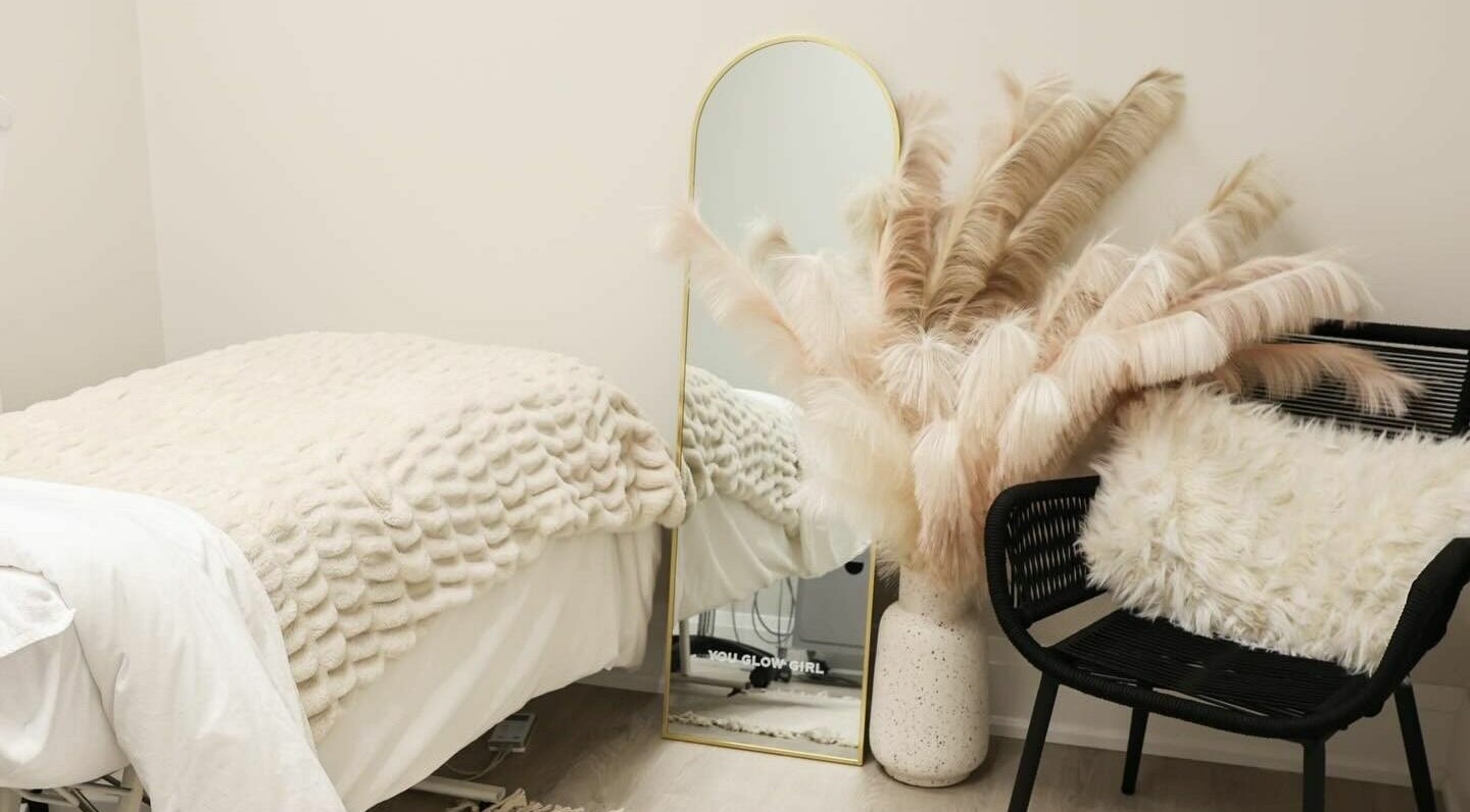 Relaxing treatment room at TS Skin Clinic and Wellness, Oakville, Ontario, CA, with cozy decor and calming vibes.