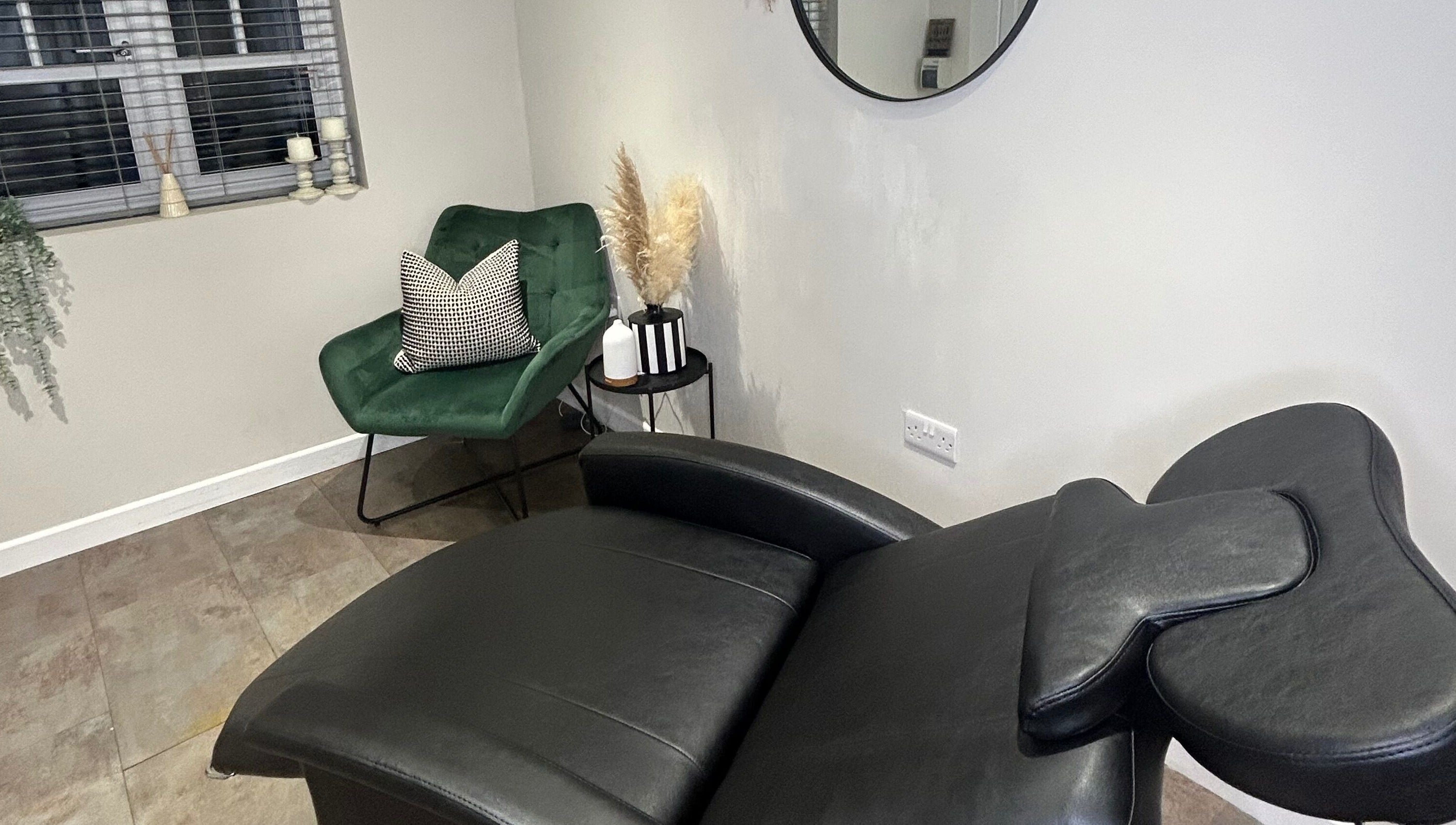 Relaxing interior at The Brow Box, Donington le Heath, England, GB, with plush chairs and decor.