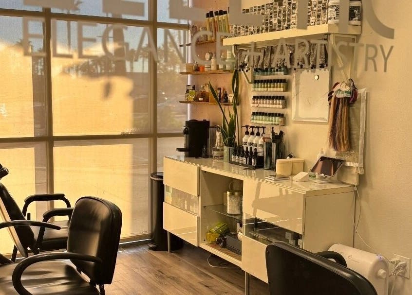 Interior of Elletic Salon Suite in Brea, California, US, showcasing modern decor and styling chairs.