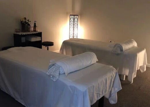 Healing Spa in Midlothian, Virginia offers serene massage tables for ultimate relaxation.