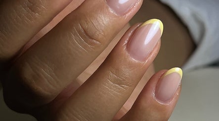 Elegant yellow French manicure nails at Pop Up Well Chiswick, London, England, GB.
