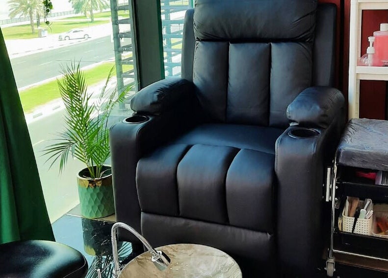 Luxurious lounge chair at Verve Men's Salon & Spa, الشارقة, إمارة الشارقةّ, AE. Perfect for relaxation.