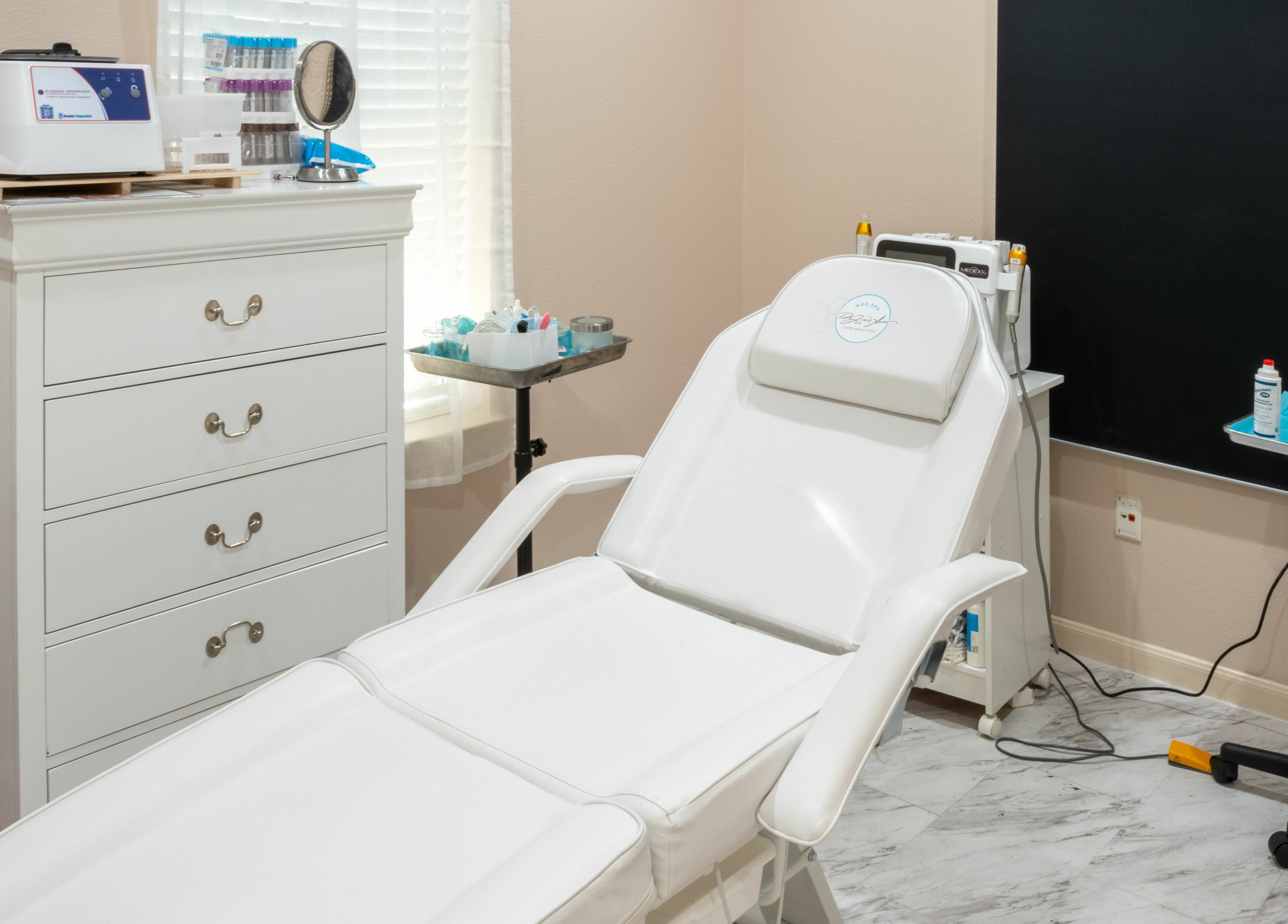 Relaxing treatment room at Ageless Envy Retreat Med Spa, Katy, Texas, US with comfortable spa chair.