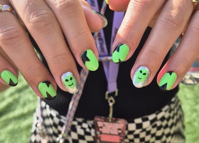 Bright green alien nail art at Studio Ten, Auckland, Auckland, NZ, showcasing creative manicure designs.