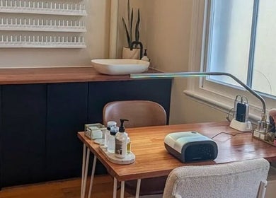 Cozy nail care station at Studio Ten, Auckland, Auckland, NZ, with tools and nail polish display.