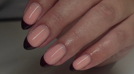 Elegant French manicure at Tech Nailz, Cardiff, Wales, GB, featuring sleek black tips.