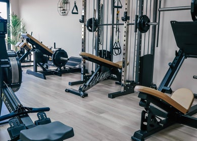 Spacious gym area at Gfit in Lavernock, Wales, GB equipped with state-of-the-art fitness machines.