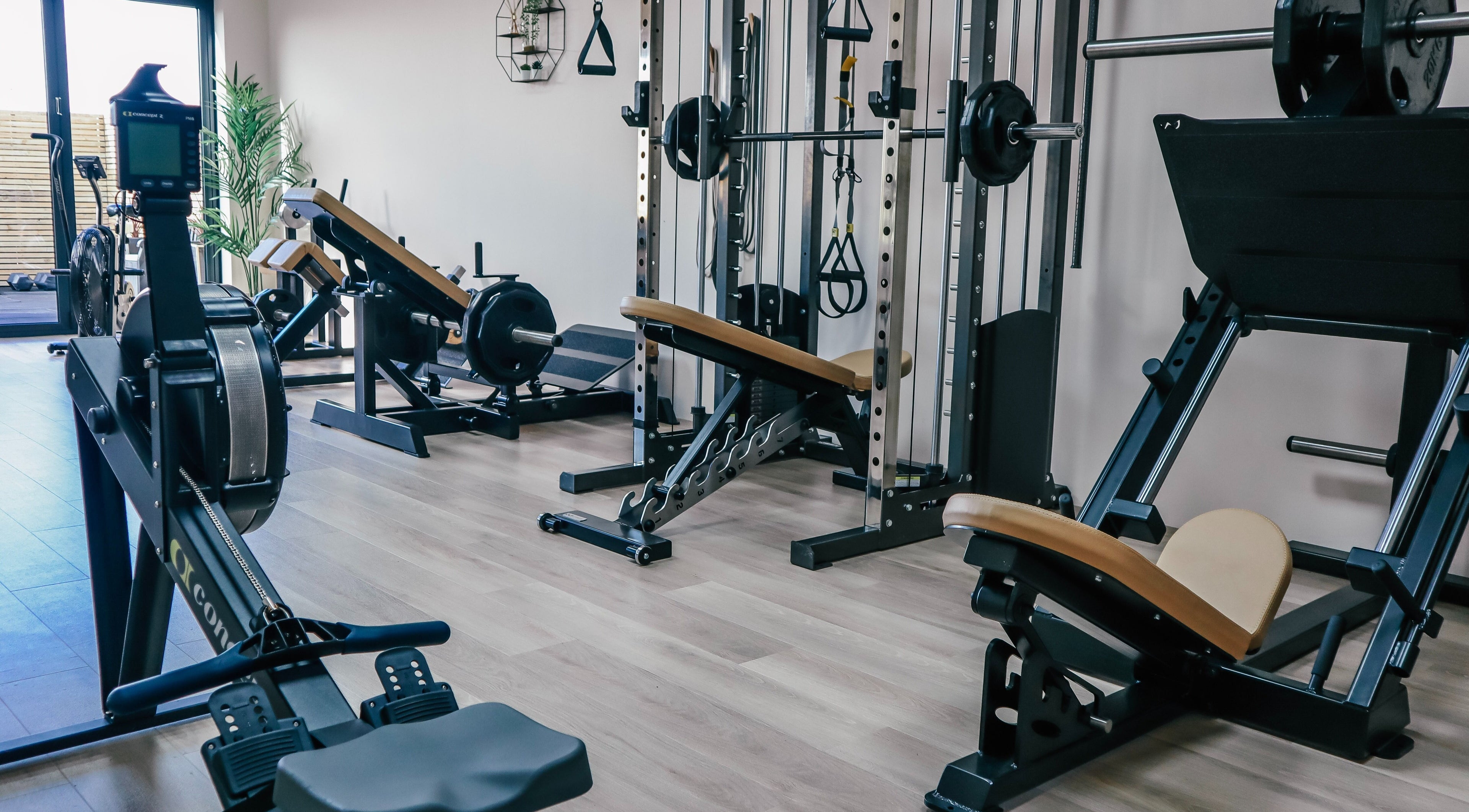 Spacious gym area at Gfit in Lavernock, Wales, GB equipped with state-of-the-art fitness machines.