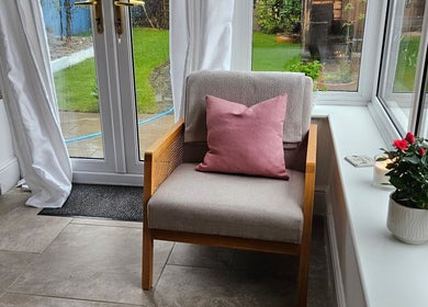 Relaxing chair with pink cushion at Renew Health & Beauty, North Thoresby, England, GB.