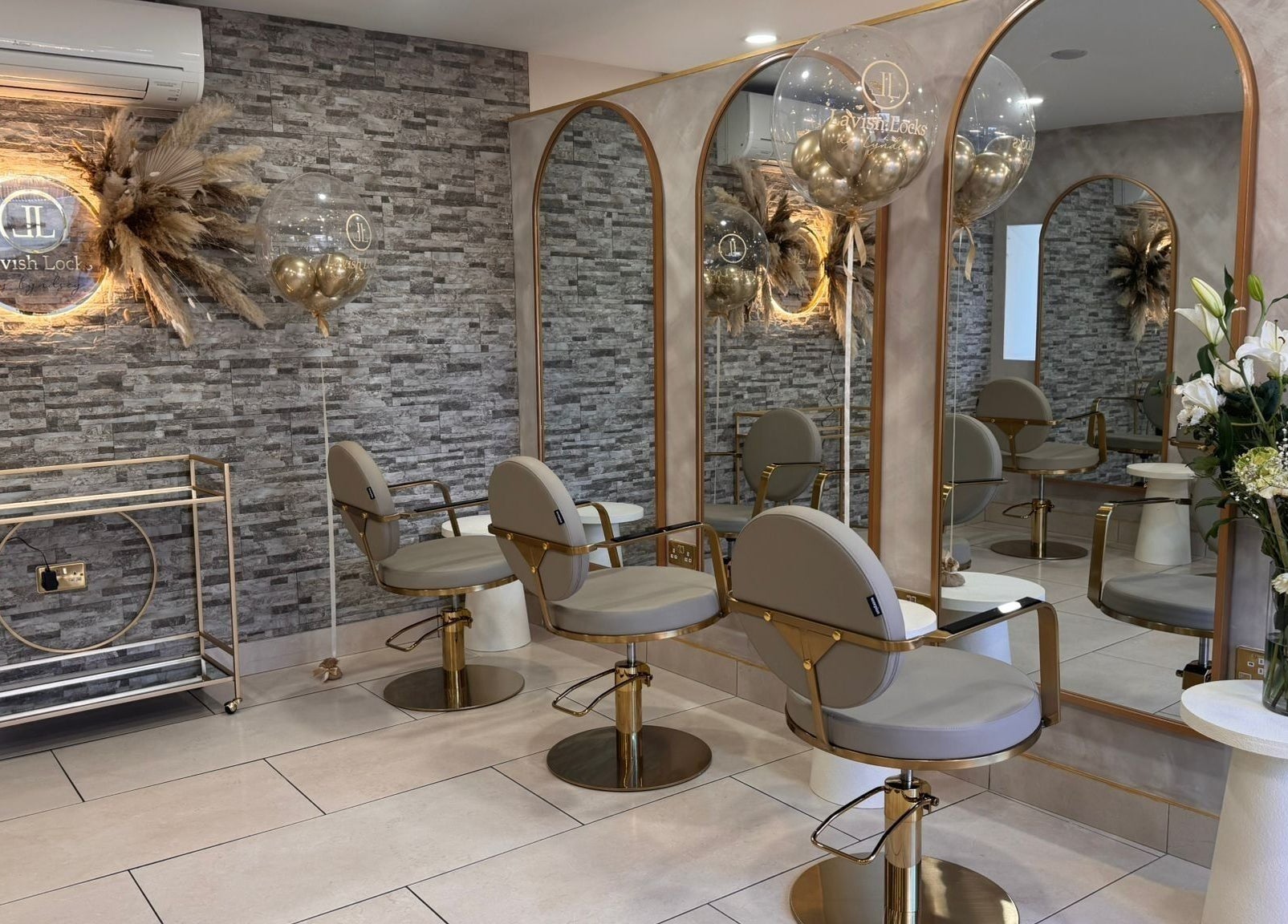 Stylish interior of Lavish Locks Ardee in County Louth, showcasing elegant salon chairs and decor.