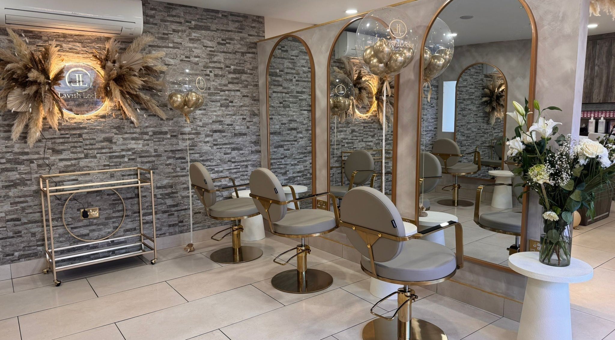 Stylish interior of Lavish Locks Ardee in County Louth, showcasing elegant salon chairs and decor.