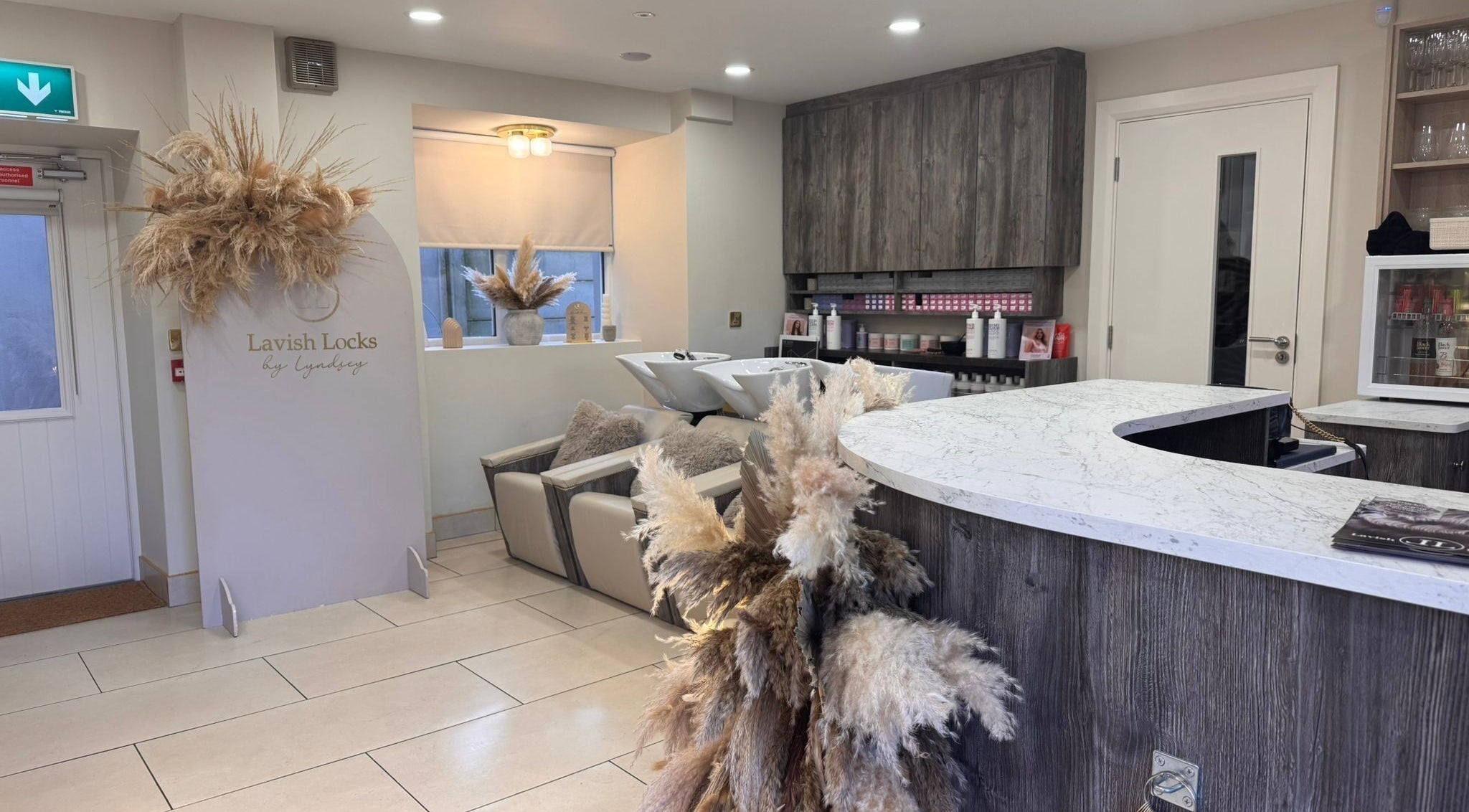 Interior of Lavish Locks Ardee in County Louth, inviting decor with warm tones and stylish seating.