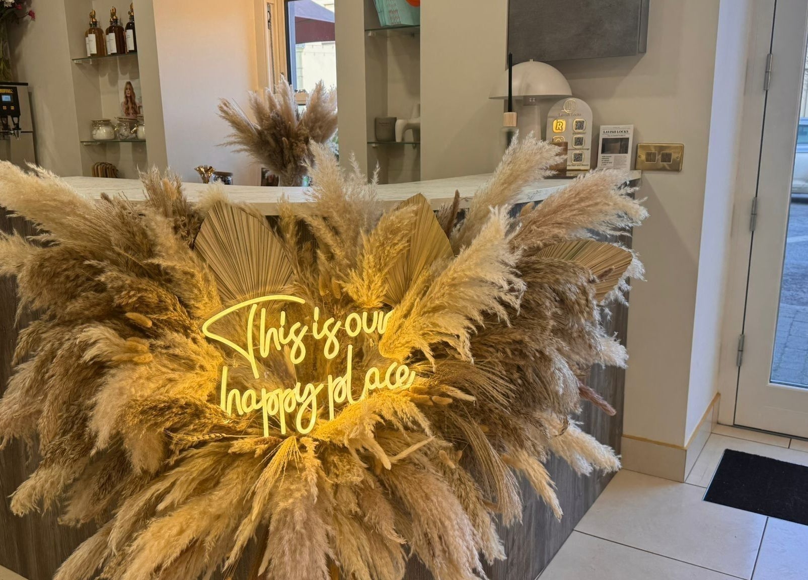 Warm entrance decor with neon message at Lavish Locks Ardee, County Louth, County Louth, IE.