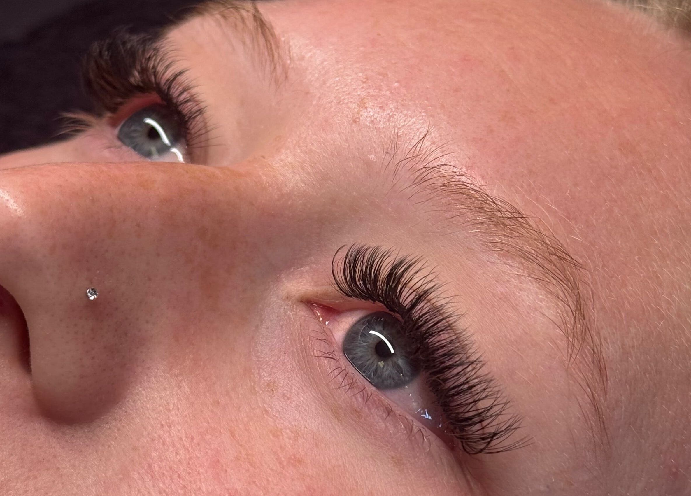 Close-up of elegant eyelash extensions by Maddy Bennetts in Loomis, California, US.