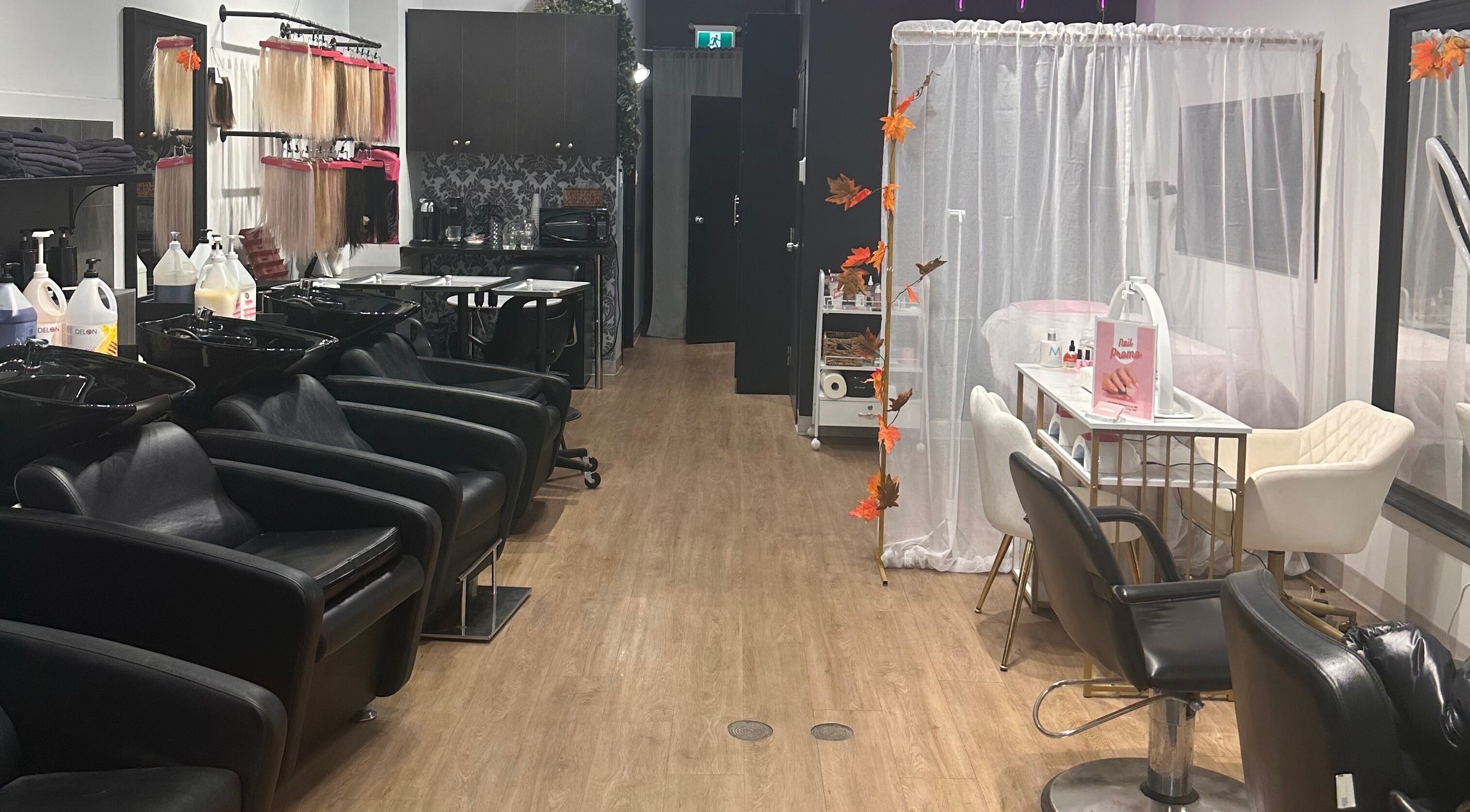 Sleek interior of Valentina Beauté in Montréal, Québec, CA, showcasing salon chairs and hair products.