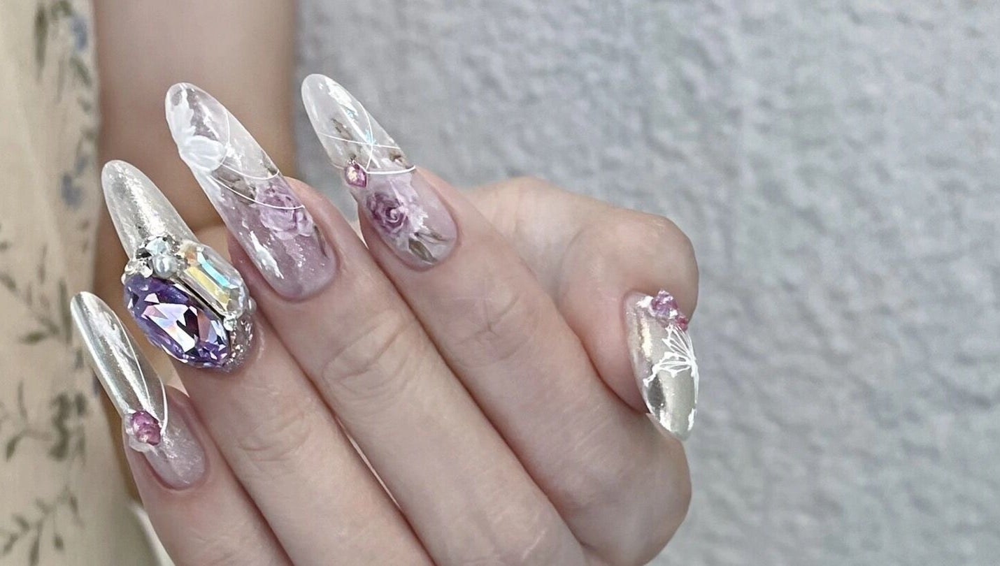 Intricate gemstone nail art at Luna Atelier, Burnaby, British Columbia, CA showcasing elegance and style.