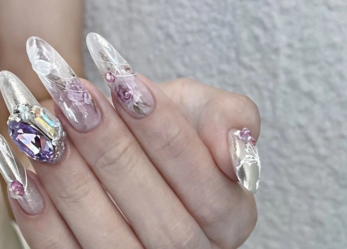 Intricate gemstone nail art at Luna Atelier, Burnaby, British Columbia, CA showcasing elegance and style.