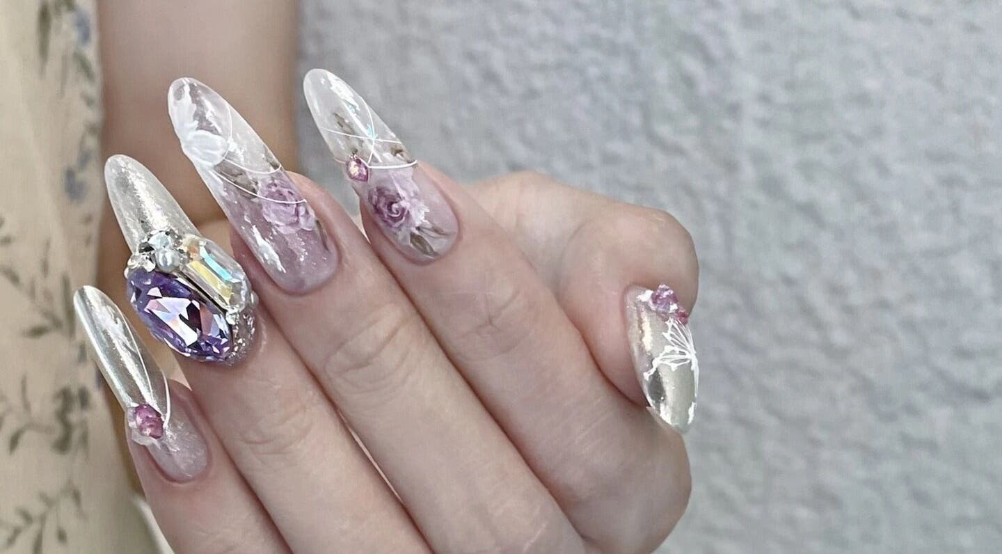 Intricate gemstone nail art at Luna Atelier, Burnaby, British Columbia, CA showcasing elegance and style.
