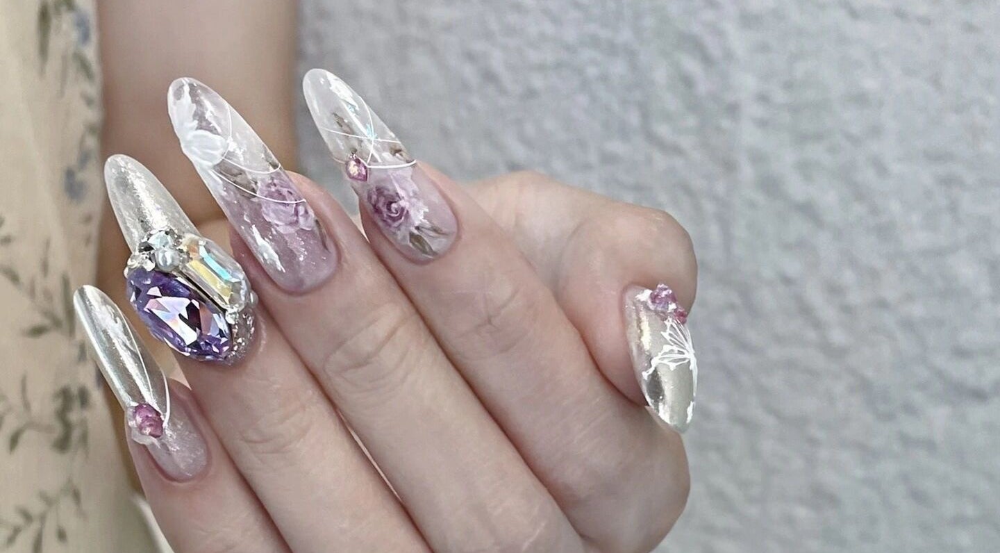 Intricate gemstone nail art at Luna Atelier, Burnaby, British Columbia, CA showcasing elegance and style.