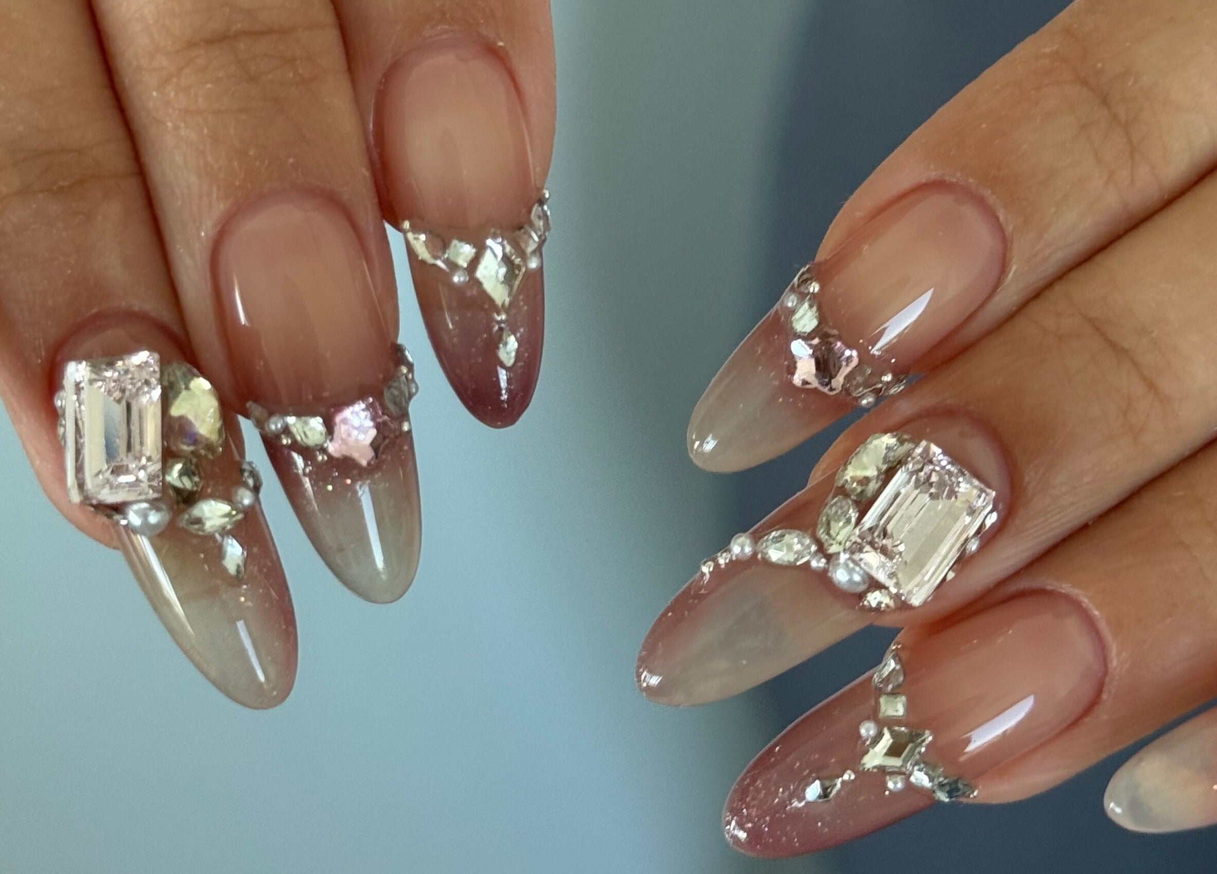 Elegant gem-accented nails at Luna Atelier, Burnaby, British Columbia, CA showcasing intricate nail art.