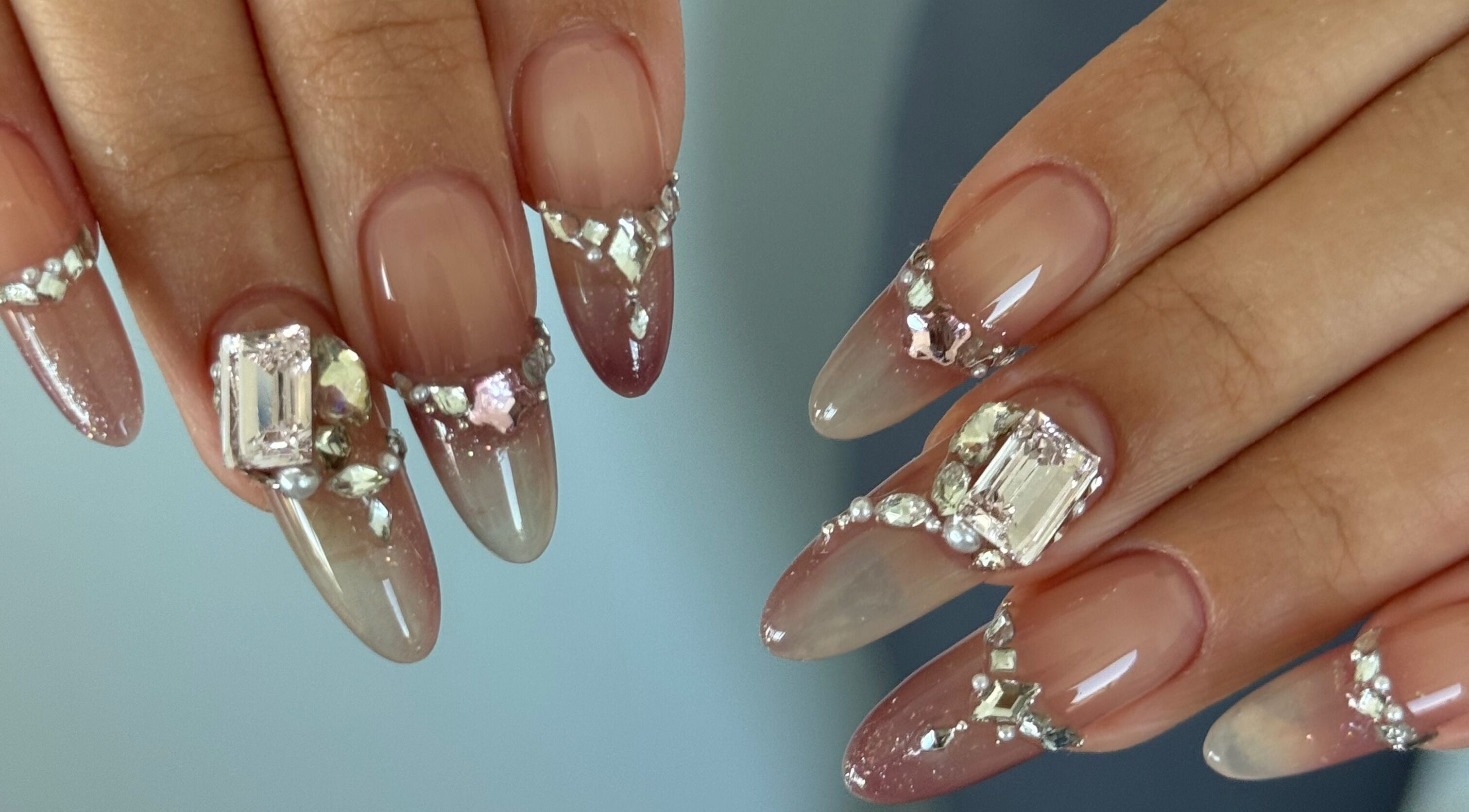 Elegant gem-accented nails at Luna Atelier, Burnaby, British Columbia, CA showcasing intricate nail art.