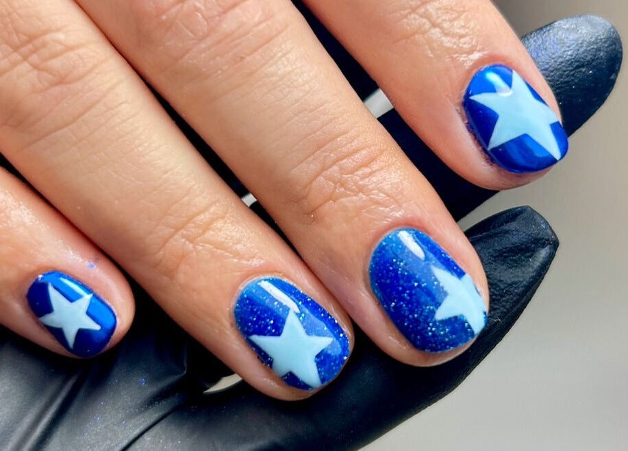 Blue starry nail art at Nails by Abby D in Plymouth, England, GB.