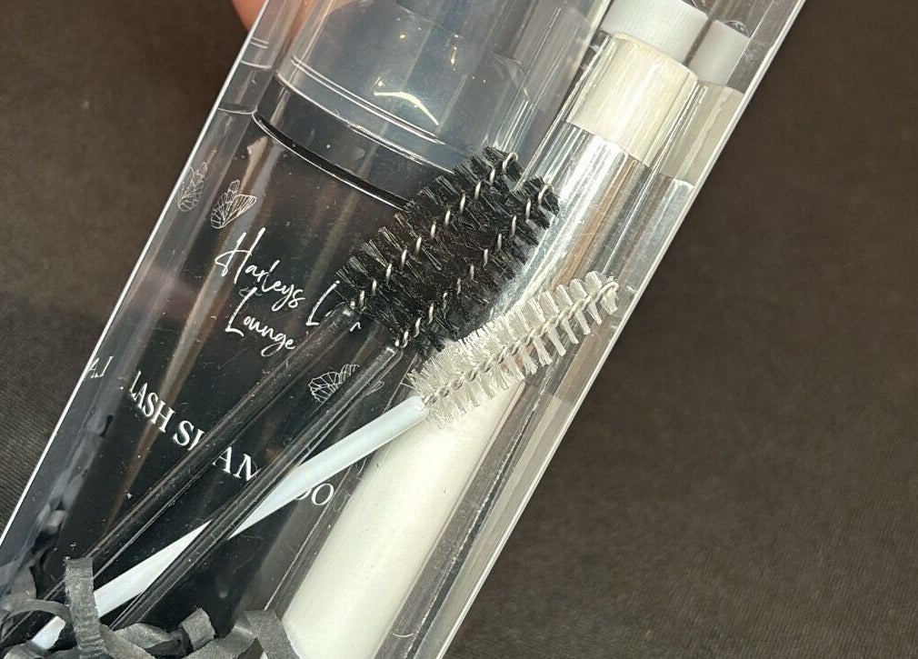Lash care kit from Harley’s Lash Lounge, Nuneaton, England, GB, featuring brushes and lash shampoo.