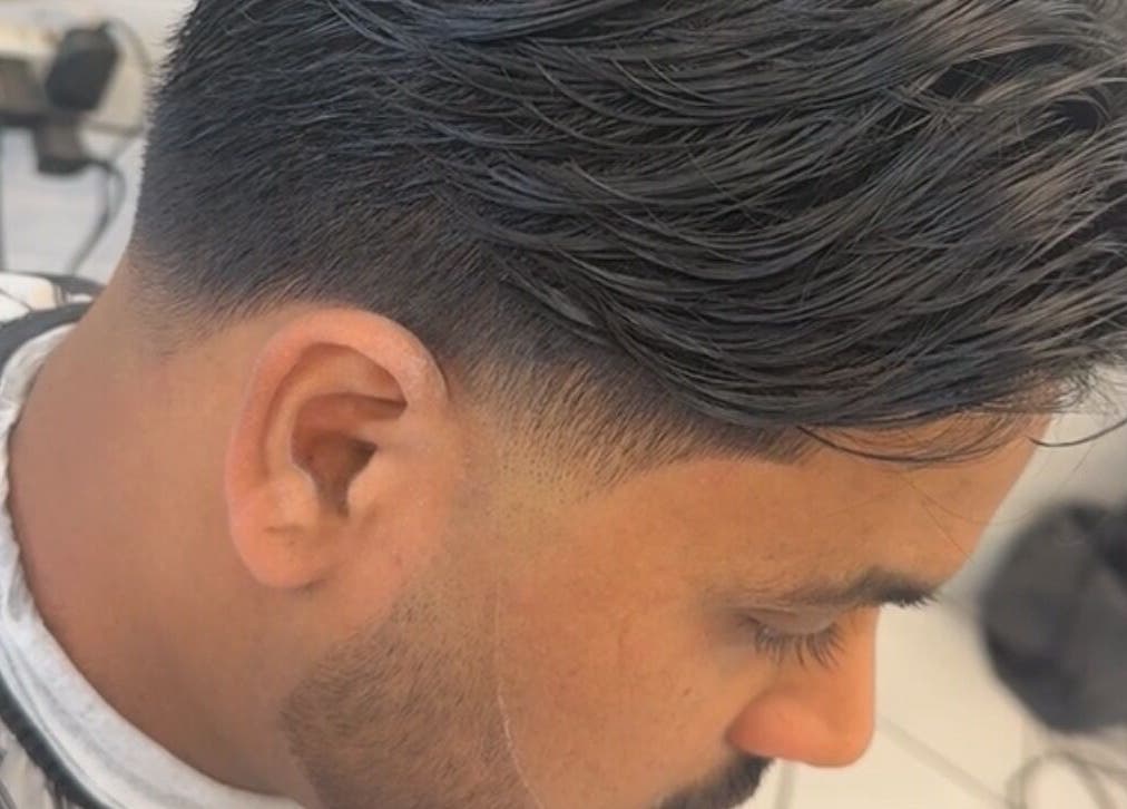 Close-up of stylish fade haircut at Elivate Studio, Nobleton, Ontario, CA offering expert grooming services.