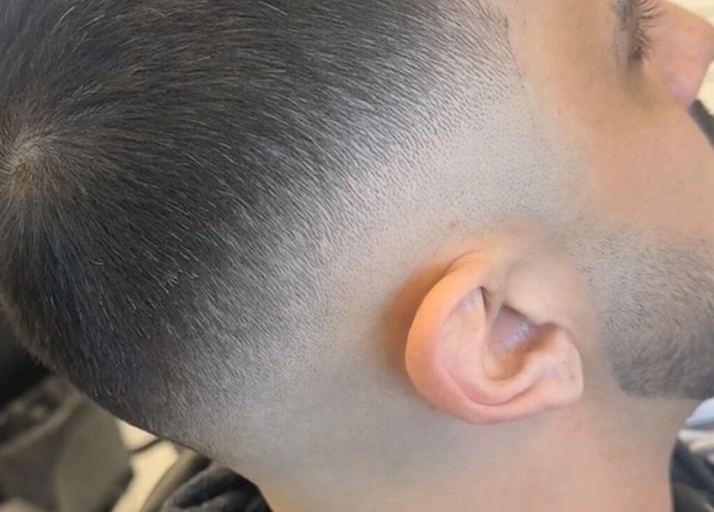 Close-up of a sleek fade haircut at Elivate Studio, Nobleton, Ontario, CA, showcasing skilled barbering.