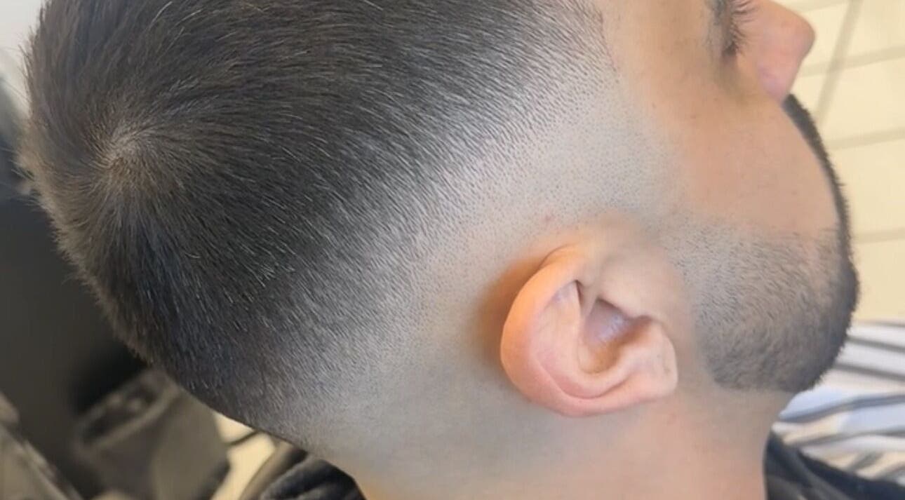 Close-up of a sleek fade haircut at Elivate Studio, Nobleton, Ontario, CA, showcasing skilled barbering.