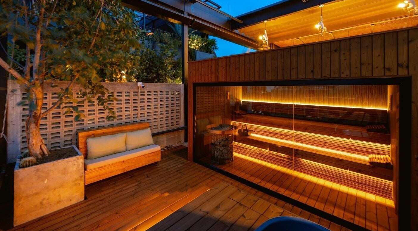 Cozy outdoor seating and sauna at Celestino Spa in Medellín, Antioquia, CO.