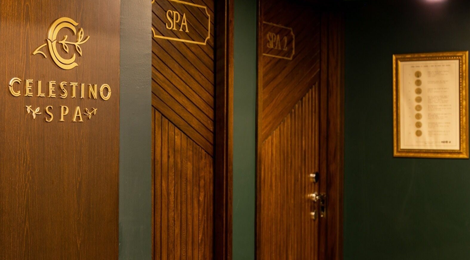 Elegant wooden doors of Celestino Spa in Medellín, Antioquia, CO, welcoming guests to a tranquil experience.