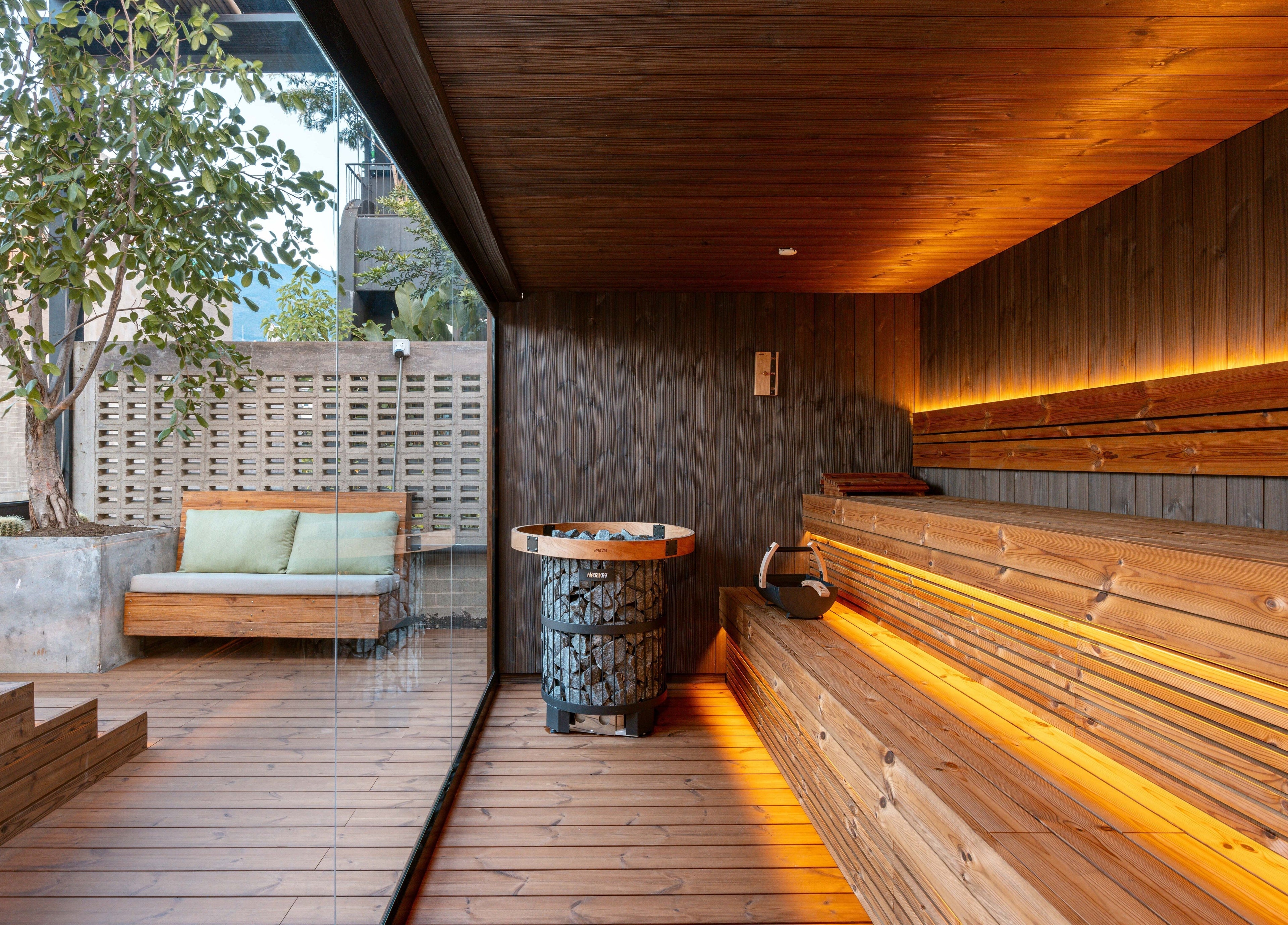 Luxurious wooden sauna at Celestino Spa, Medellín, Antioquia, CO, offering a tranquil wellness experience.