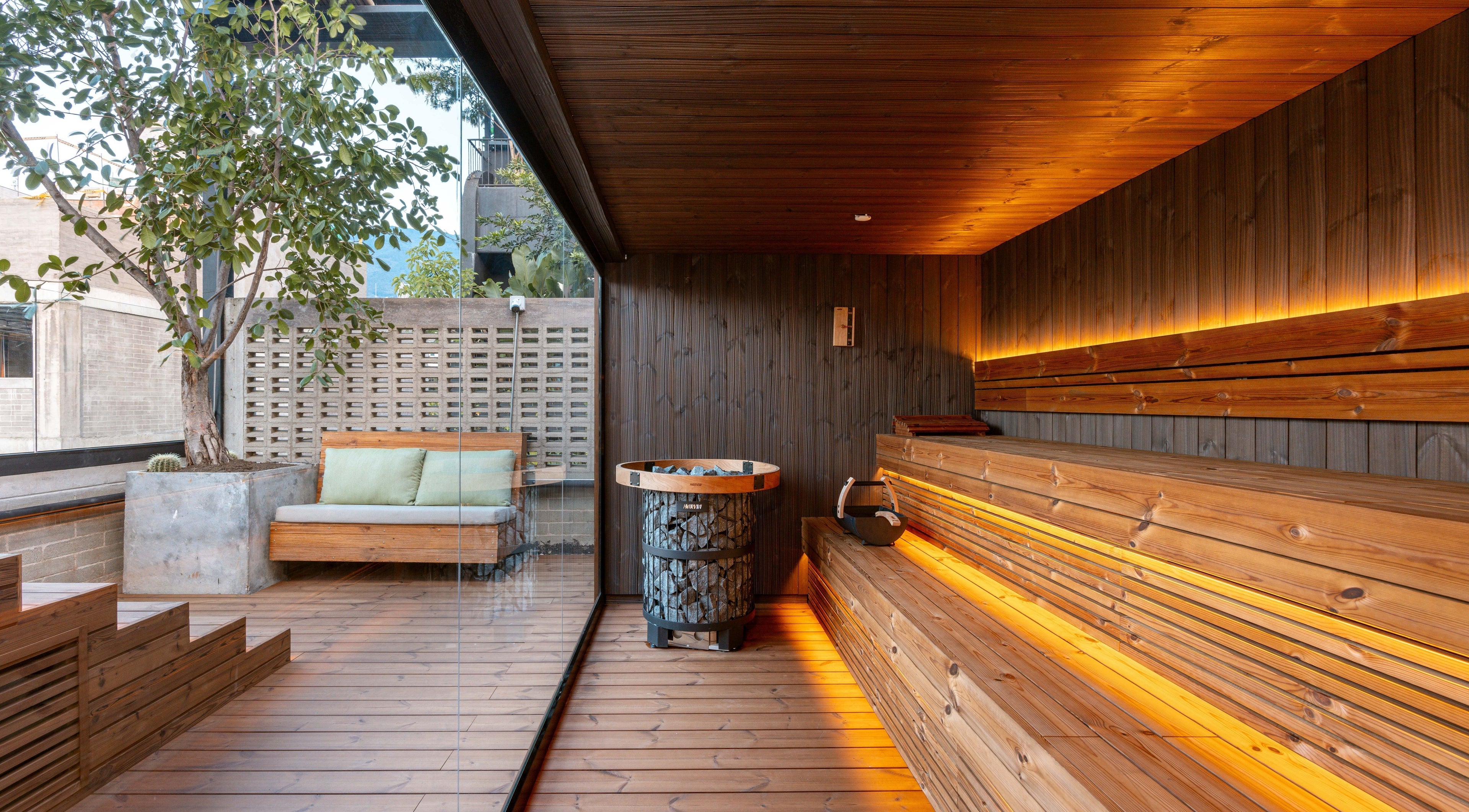 Luxurious wooden sauna at Celestino Spa, Medellín, Antioquia, CO, offering a tranquil wellness experience.