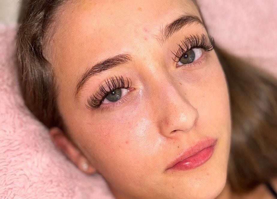 Woman with lush eyelashes at L, Maidstone, England, GB capturing natural beauty and elegance.