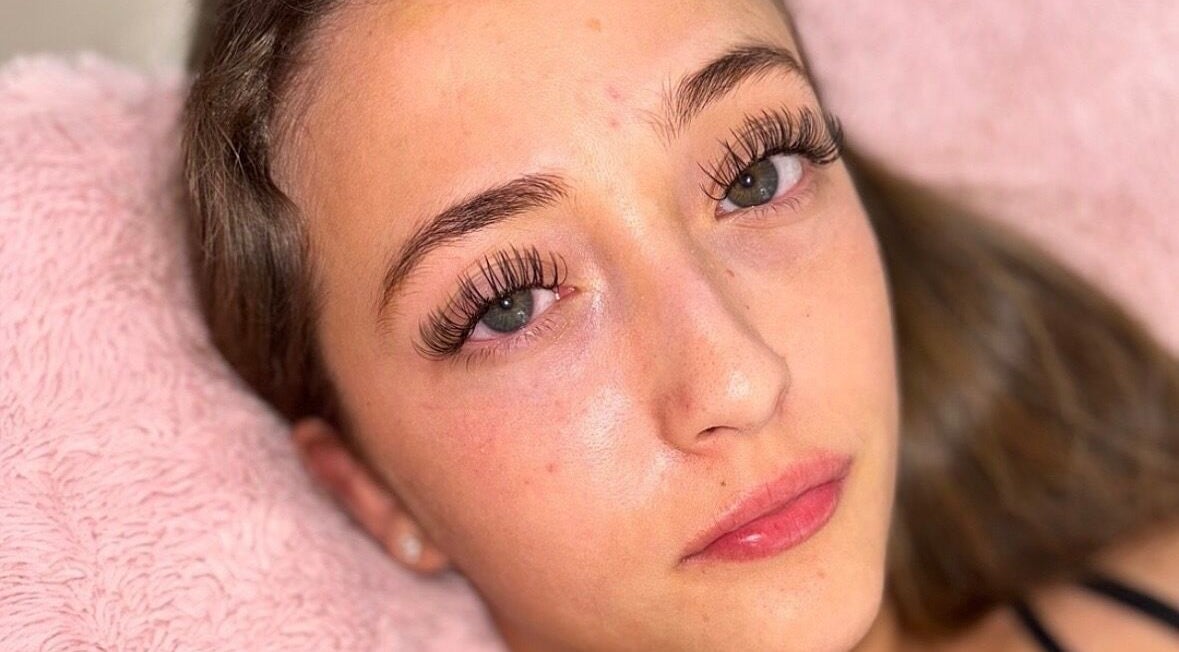 Woman with lush eyelashes at L, Maidstone, England, GB capturing natural beauty and elegance.