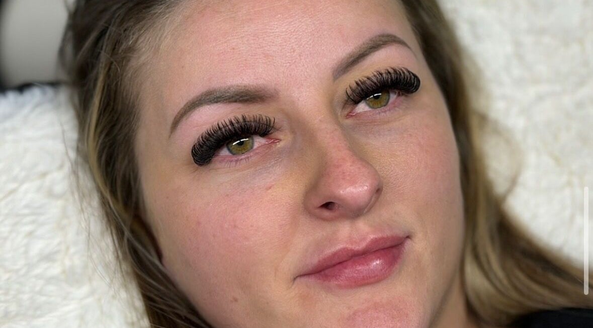 Close-up of woman with dramatic eyelashes at L in Maidstone, England, GB.