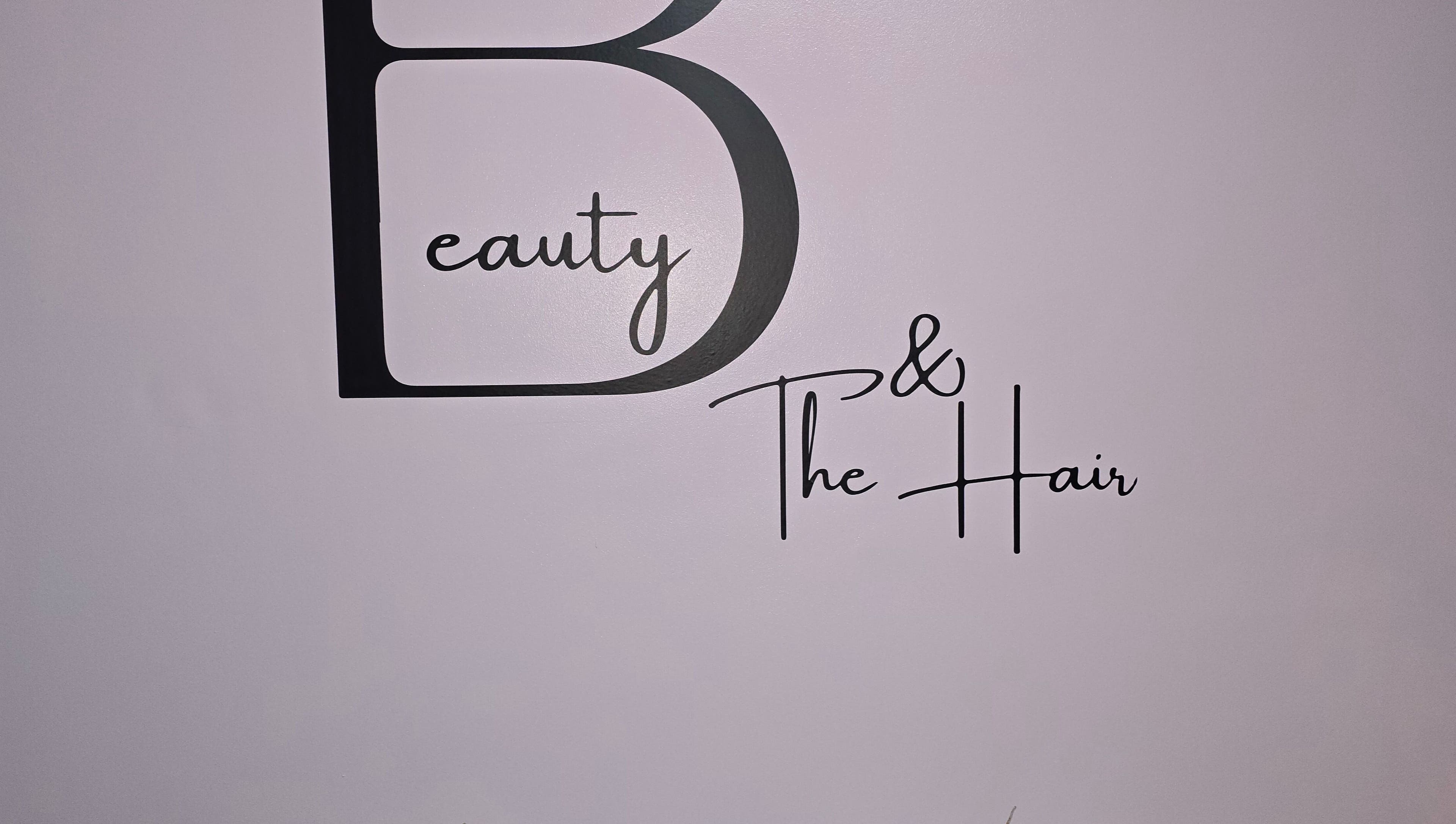 Elegant wall logo of Beauty and the Hair at ENFIELD, England, GB.