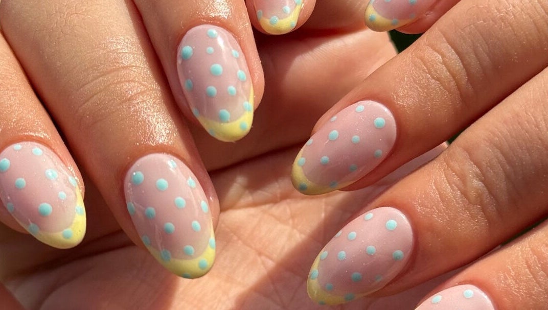 Polka dot nail art at Morgan Sophie Nails, Colchester, England, GB, showcasing unique style and finesse.