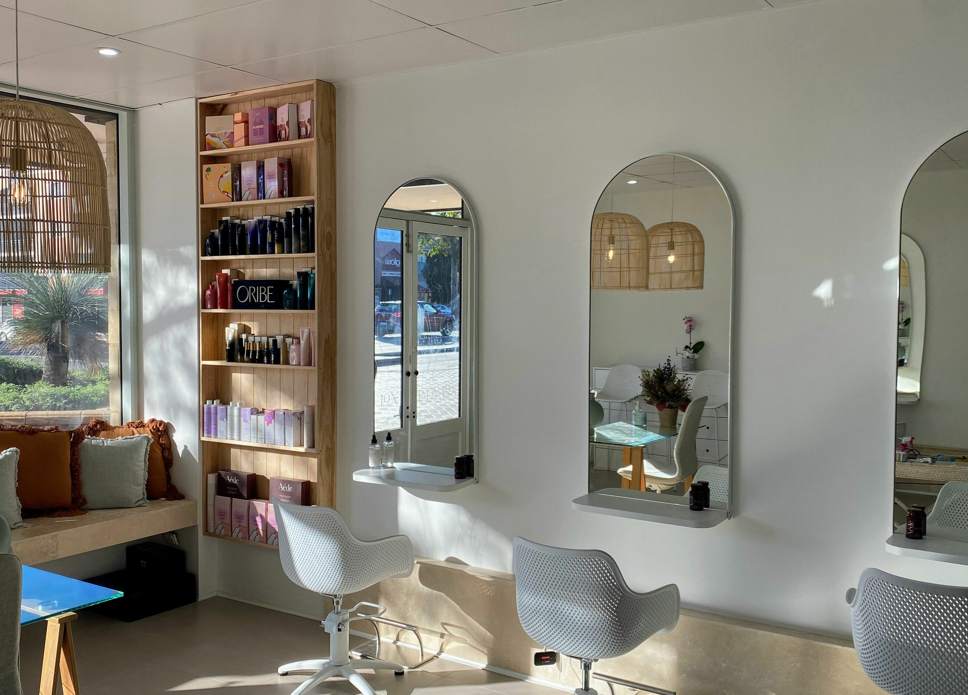 Stylish interior of Lady Lox salon in Joondalup, Western Australia, featuring modern decor and comfortable seating.