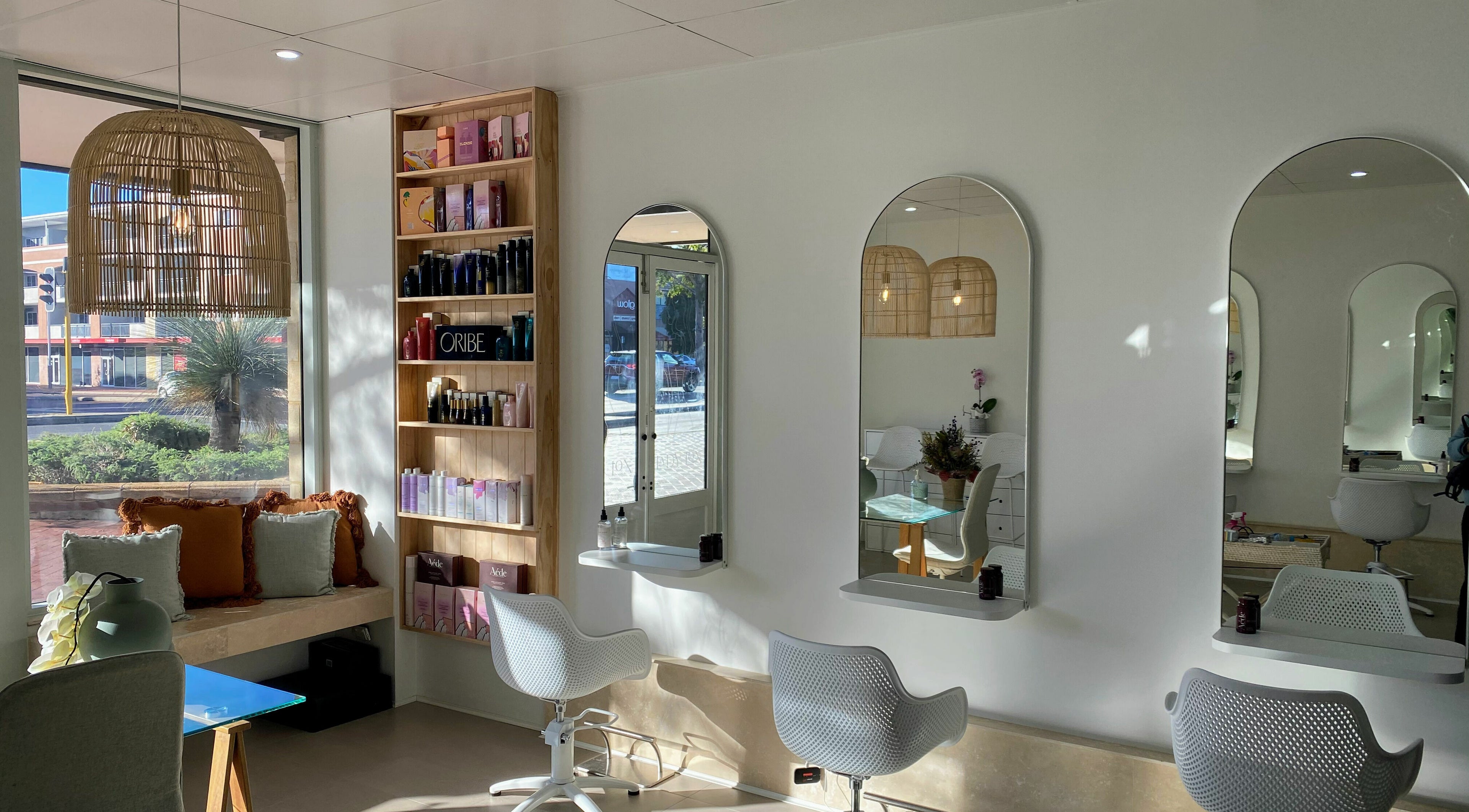 Stylish interior of Lady Lox salon in Joondalup, Western Australia, featuring modern decor and comfortable seating.
