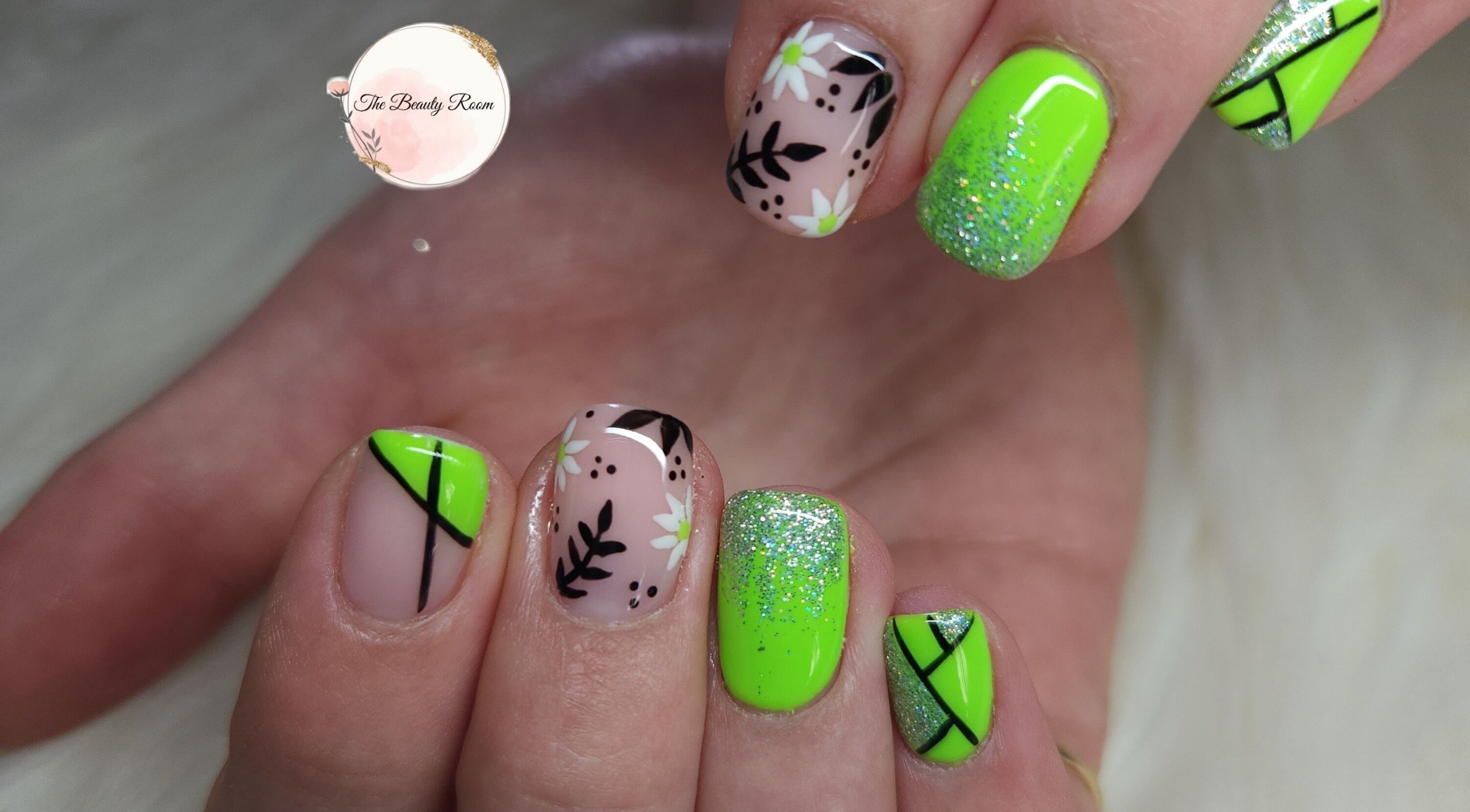 Vibrant floral neon nail art at The Beauty Room, Gqeberha, Eastern Cape, ZA, showcasing intricate design.