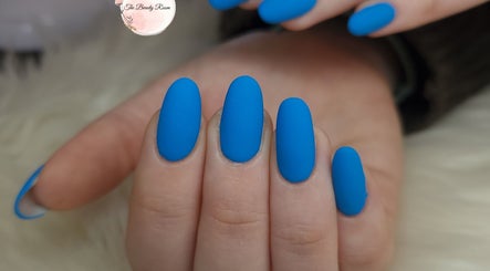 Vibrant blue nails at The Beauty Room, Gqeberha, Eastern Cape, ZA showcasing stunning nail artistry.