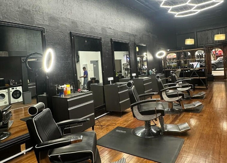 Sophisticated interior of Only Fades Barbershop Inv, Invercargill, Southland, NZ with stylish barber chairs.