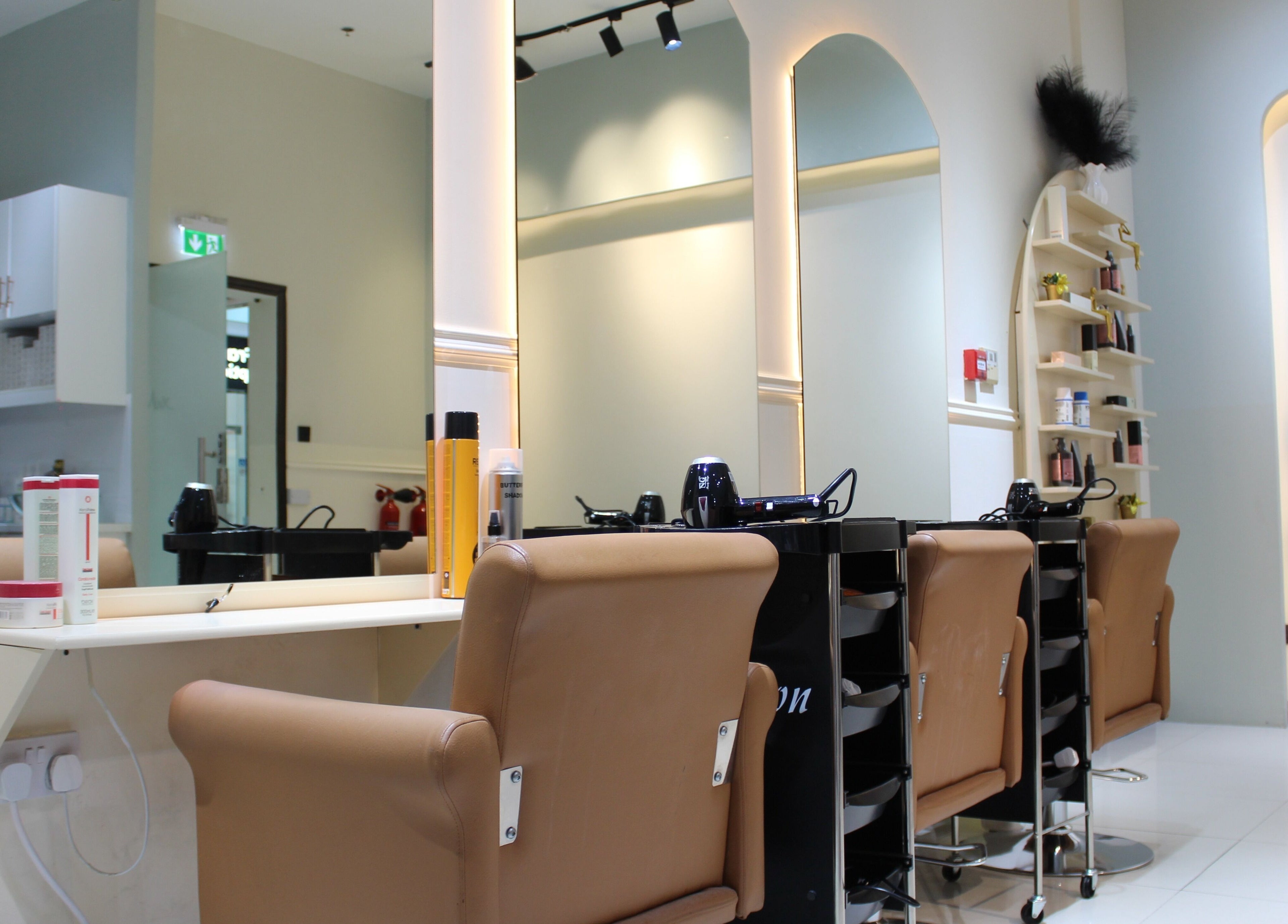 Elegant salon chairs and styling stations at Vivant Beauty Salon, Dubai, Dubai, AE, showcasing modern design.