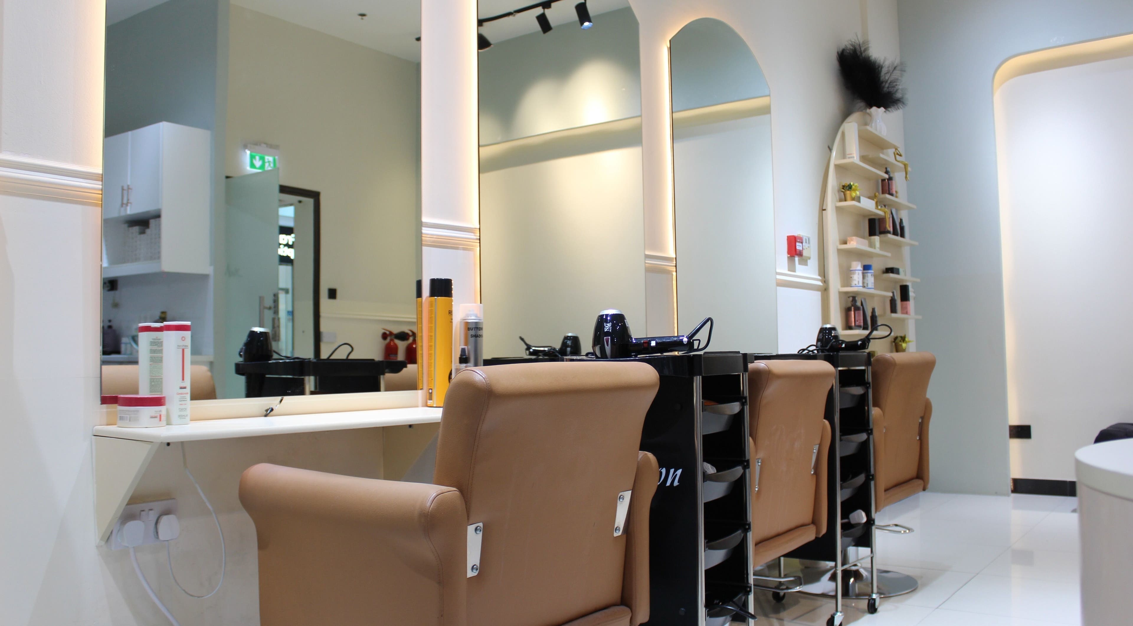 Elegant salon chairs and styling stations at Vivant Beauty Salon, Dubai, Dubai, AE, showcasing modern design.