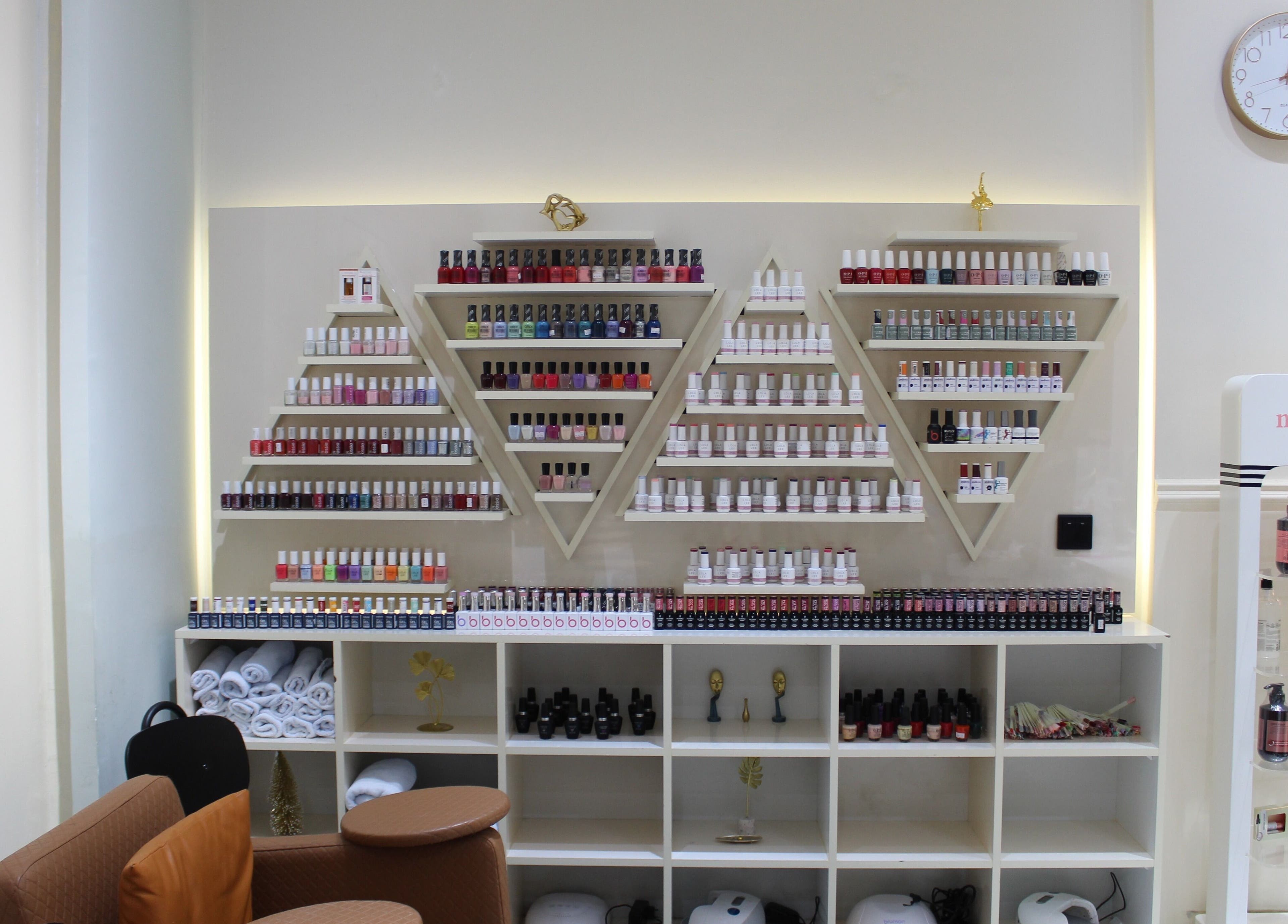 Vibrant nail polish display at Vivant Beauty Salon, Dubai, Dubai, AE, showcasing a variety of colors.