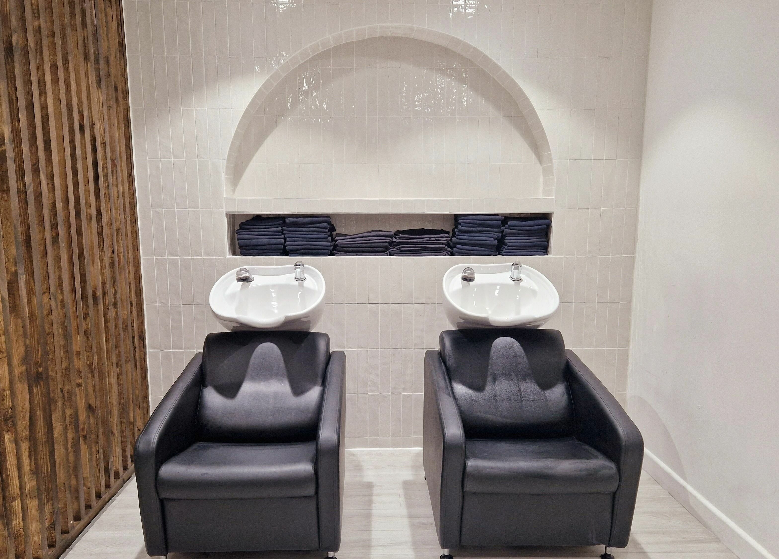 Elegant wash stations at Tress and Bloom Neath, Neath, Wales, GB provide a luxurious hair care experience.