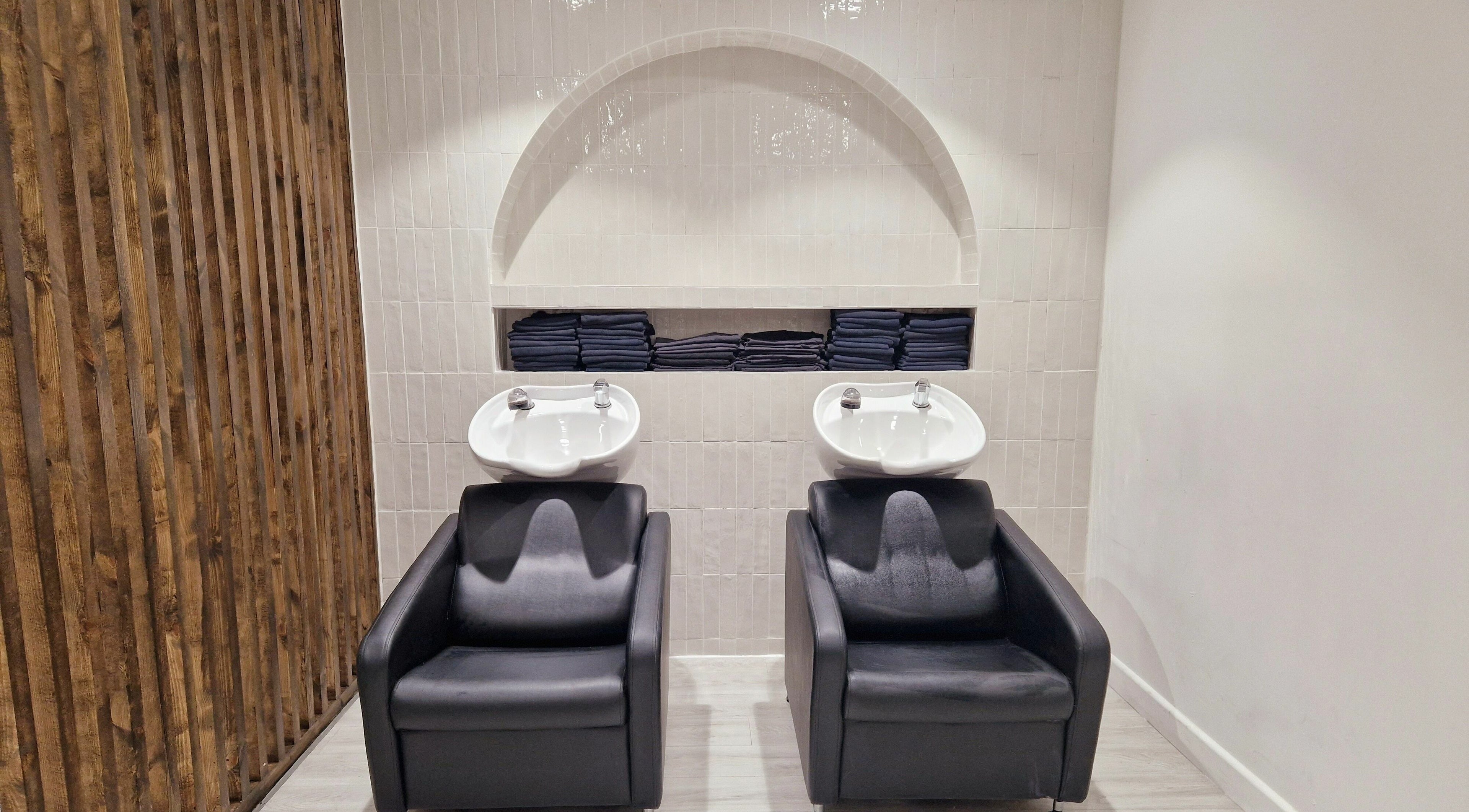 Elegant wash stations at Tress and Bloom Neath, Neath, Wales, GB provide a luxurious hair care experience.