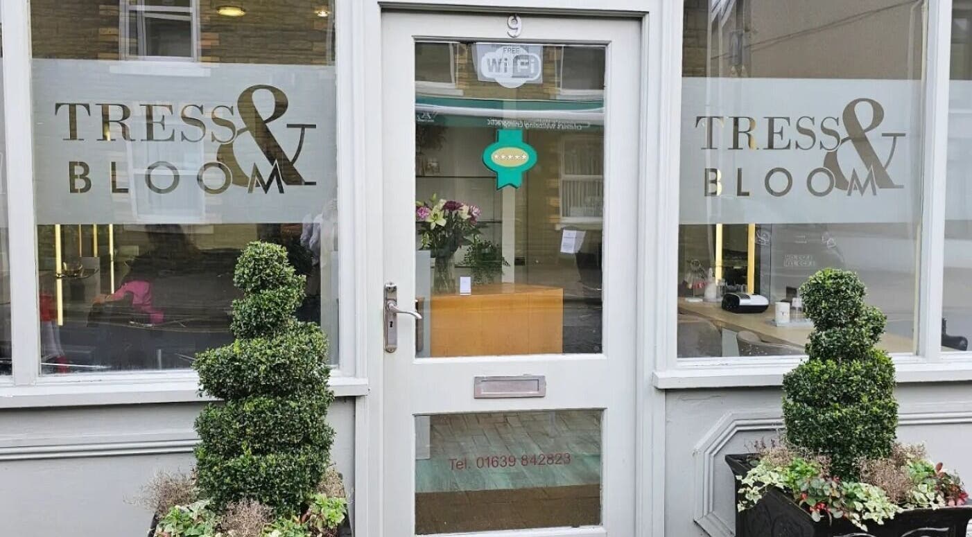 Entrance of Tress and Bloom Ystradgynlais, Ystradgynlais, Wales, GB featuring sleek decor and welcoming vibe.